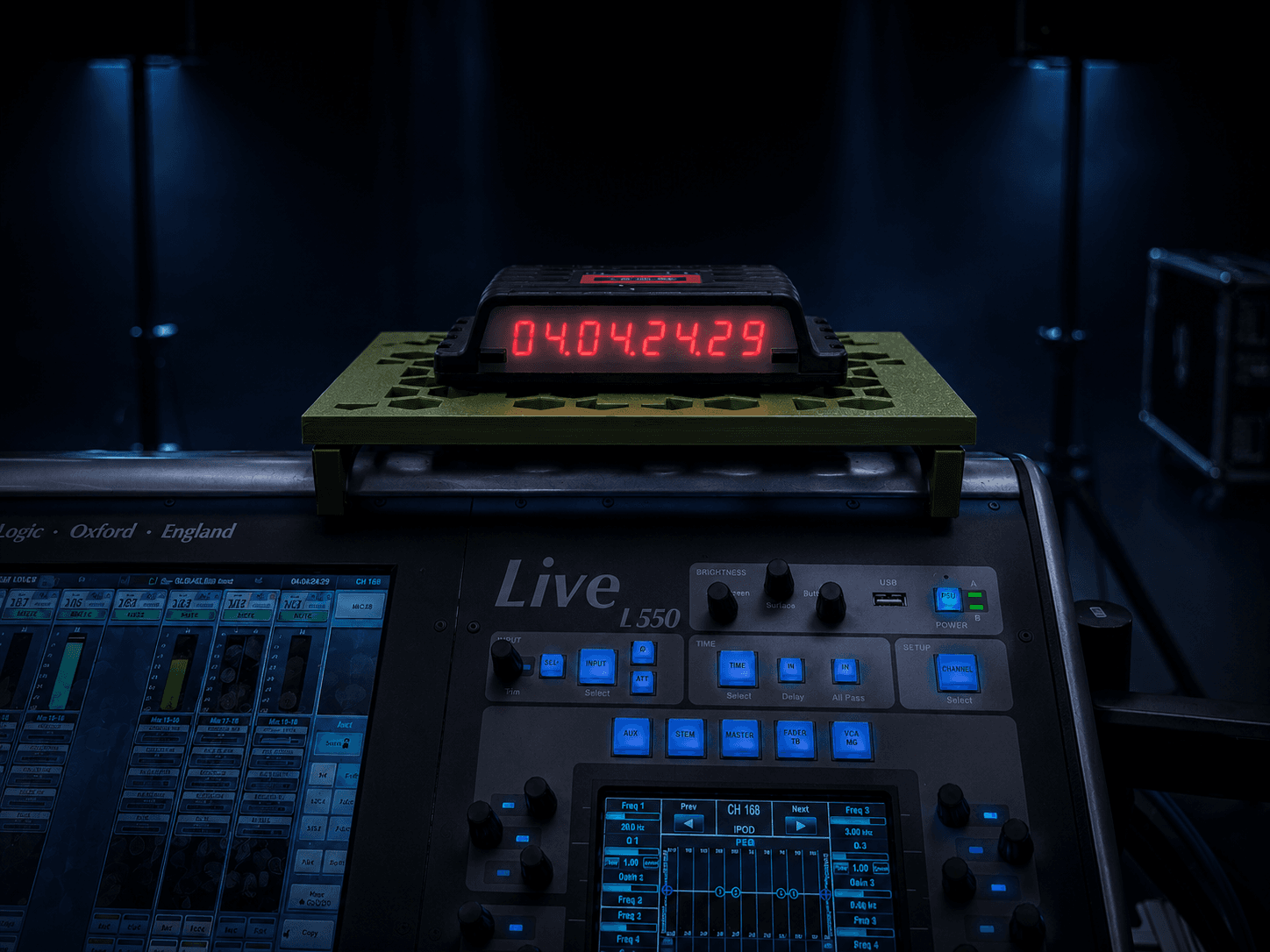 The TC SSL Shelf mounted on an SSL Live console at front of house, holding a timecode unit.